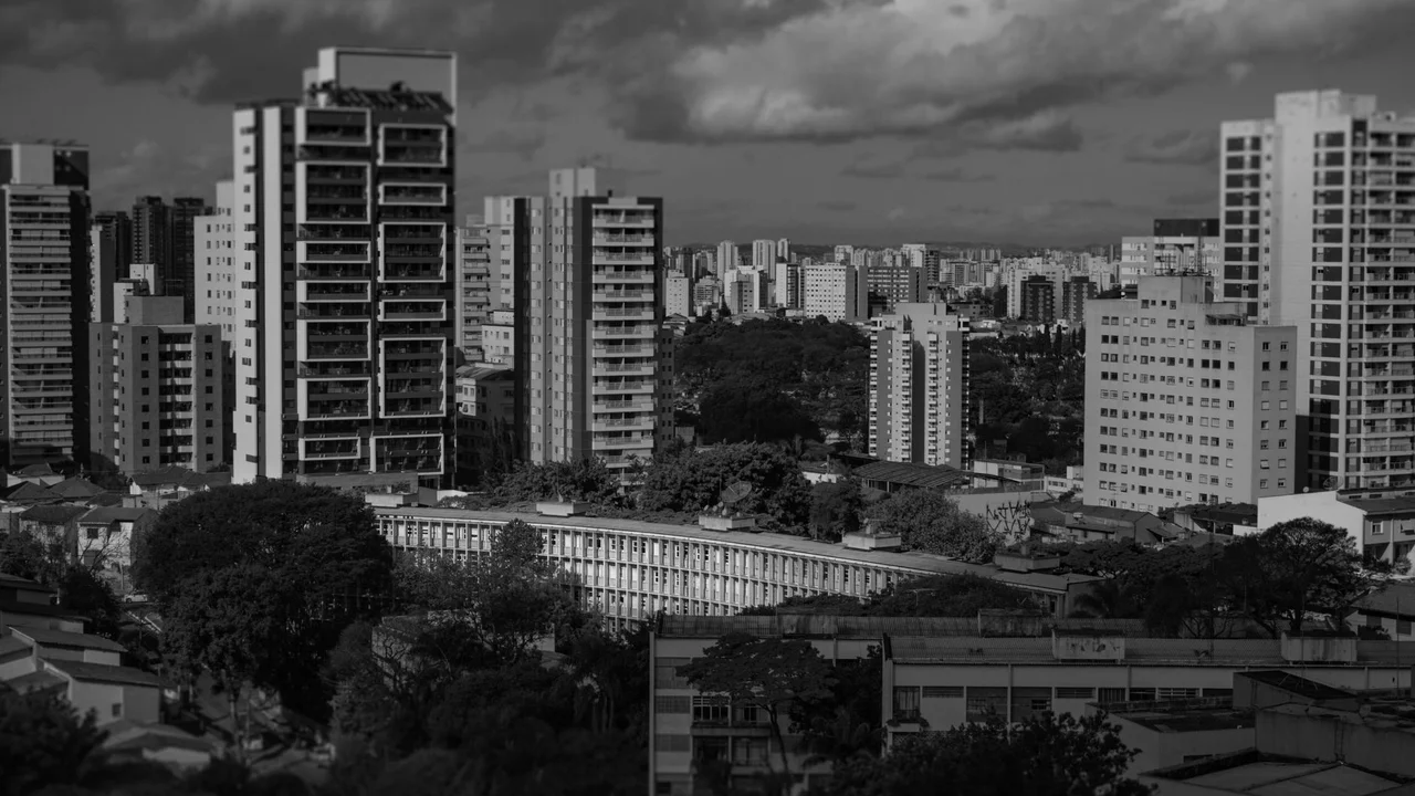 A monochrome view of São Paulo's urban skyline, capturing its modern architecture.