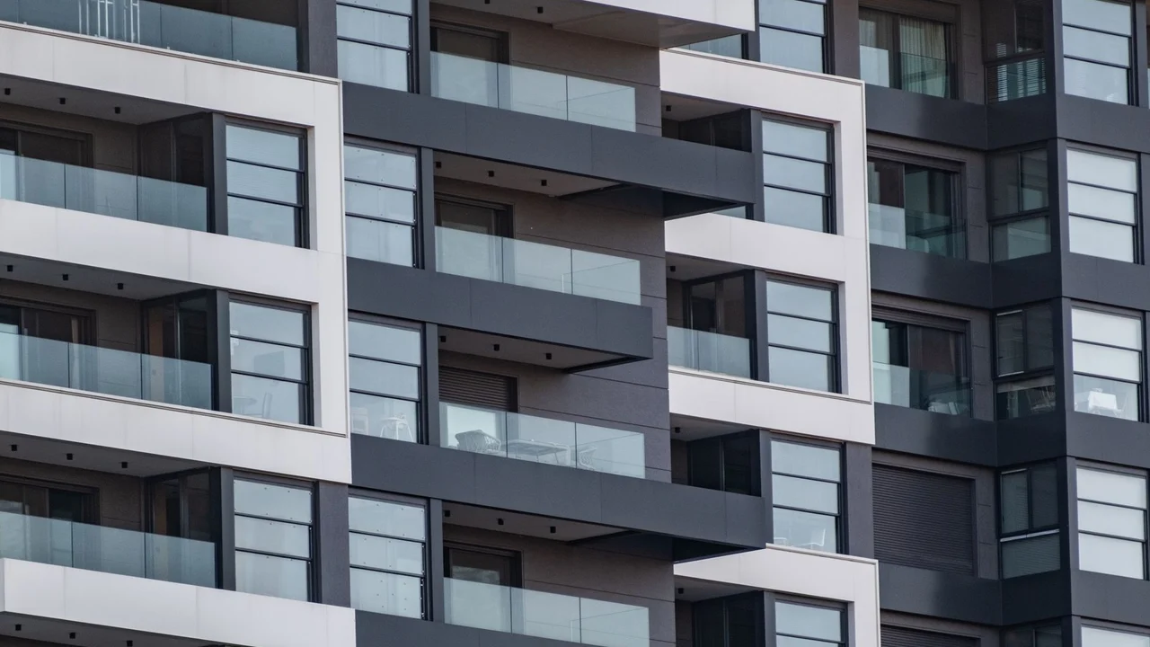 Contemporary apartment facade with glass balconies in Bornova, İzmir, Türkiye.